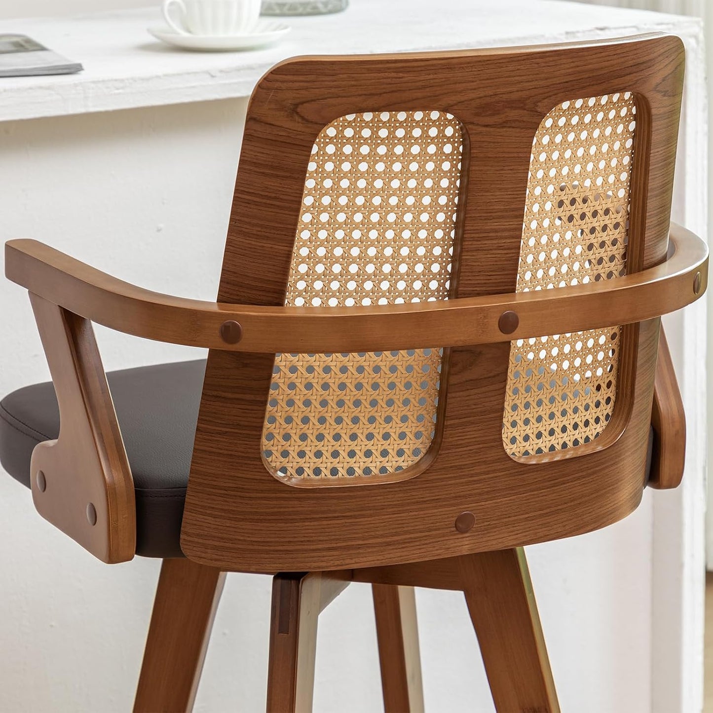 Walnut Rattan Swivel Counter Stool with Arms Green Upholstered Seat